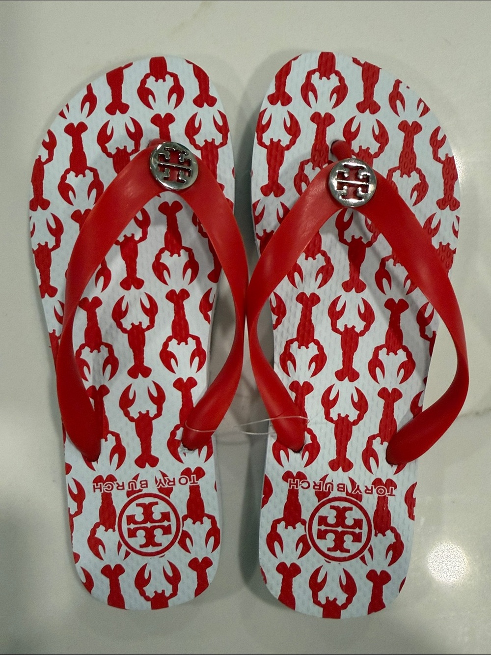 Tory Burch Red and White Lobster flip flops.